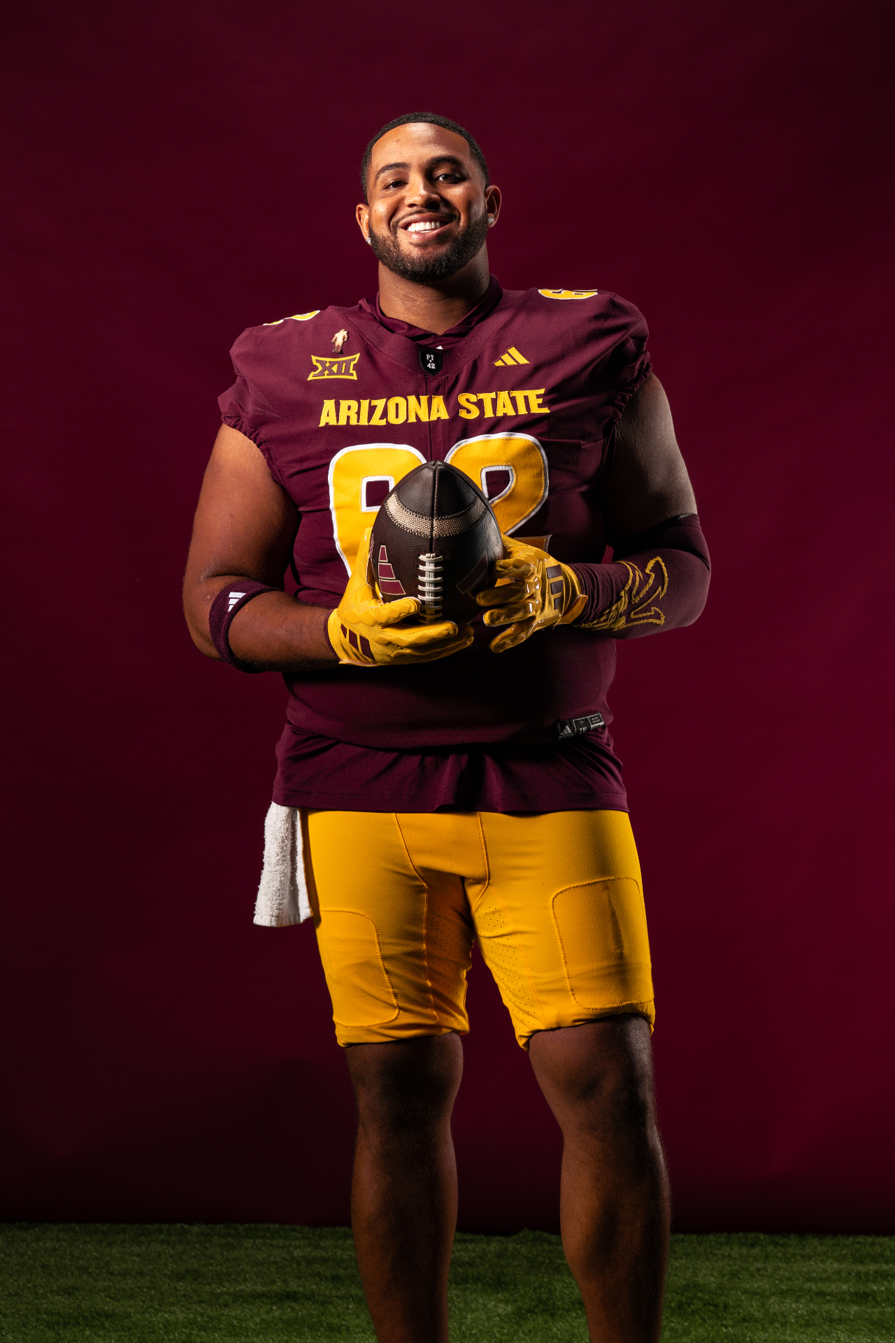 Ben Coleman in Arizona State uniform holding a football